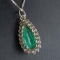 Preview: 18k gold pendant with a 4ct emerald and 1ct diamonds