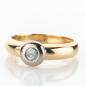 Preview: Ring aus 585er Gelb- und Weißgold mit 0.12ct Brillant