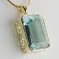 Preview: 14k gold pendant with an 45.22ct aquamarine
