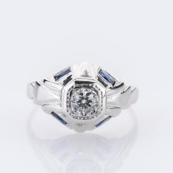 Ring aus 585er Weißgold mit 0,25 ct Brillant und 0,10 ct Saphiren