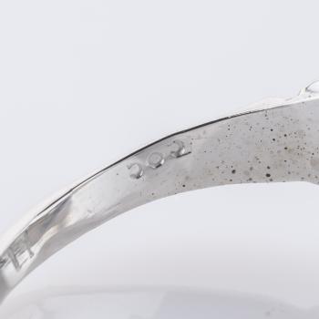Ring aus 585er Weißgold mit 0,25 ct Brillant und 0,10 ct Saphiren