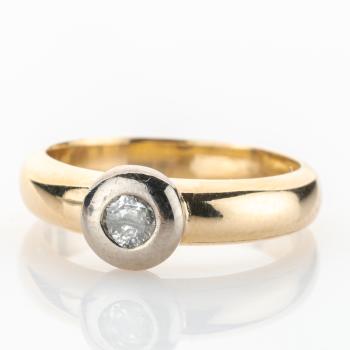 Ring aus 585er Gelb- und Weißgold mit 0.12ct Brillant
