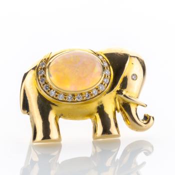 18k gold brooch with an opal and diamonds
