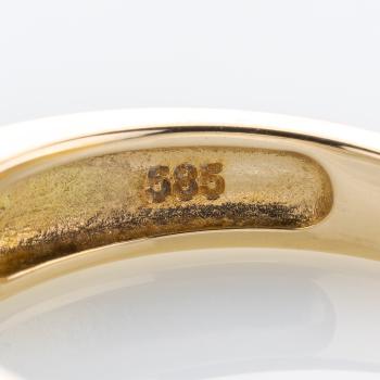 14k gold ring with a diamond