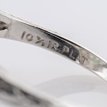 0.80ct Diamond and 0.06ct Emerald Ring in Platinum
