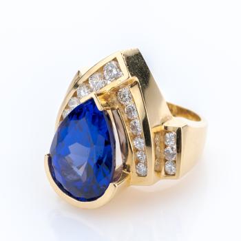 Ladies ring (14k gold) with a 10.50ct tanzanite and 1.20ct diamonds