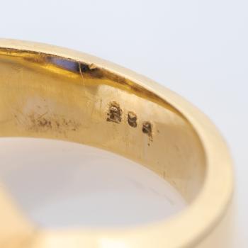 Ladies ring (14k gold) with a 10.50ct tanzanite and 1.20ct diamonds