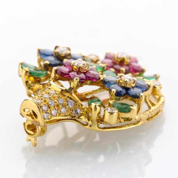 Brosche aus 750er Gold mit Rubin, Saphir, Smaragd und Brillanten