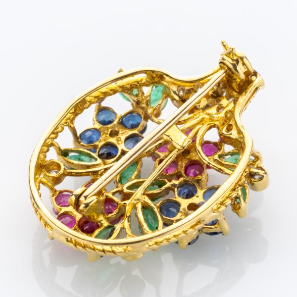 Brosche aus 750er Gold mit Rubin, Saphir, Smaragd und Brillanten