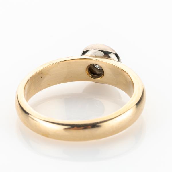 Ring aus 585er Gelb- und Weißgold mit 0.12ct Brillant