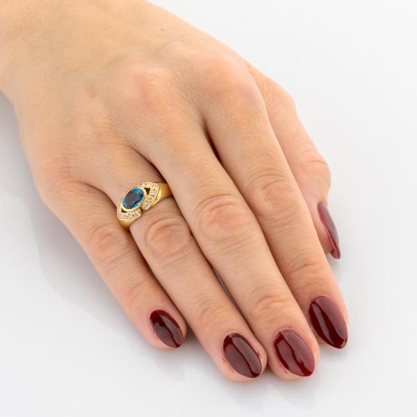 Vintage Ring aus 750er Gold mit 1.50ct Blautopas und 0.28ct Brillanten
