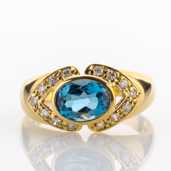 Vintage Ring aus 750er Gold mit 1.50ct Blautopas und 0.28ct Brillanten