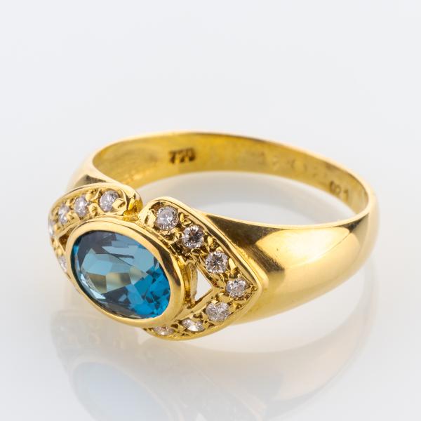 Vintage Ring aus 750er Gold mit 1.50ct Blautopas und 0.28ct Brillanten