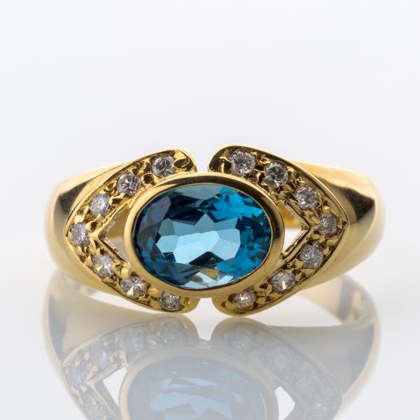 Vintage Ring aus 750er Gold mit 1.50ct Blautopas und 0.28ct Brillanten