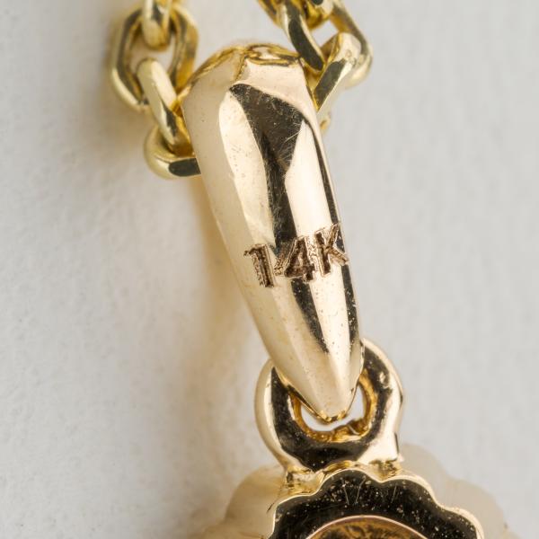 14k gold pendant with a 1.42ct ruby and 0.30ct diamonds