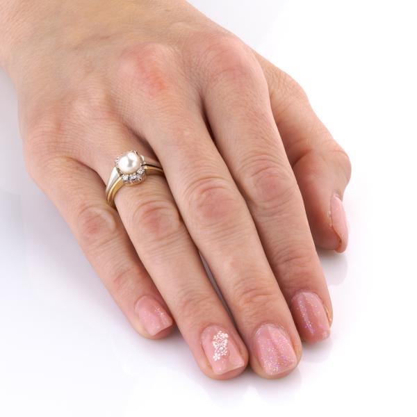 Vintage Ring aus 585er Gold mit Perle und Brillanten