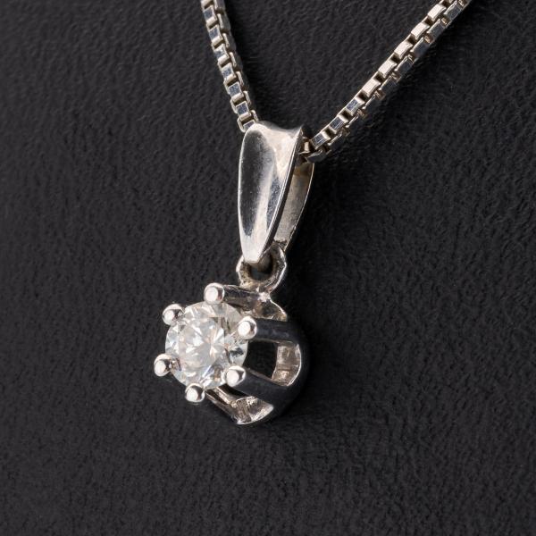 Vintage 14k gold pendant with a diamond