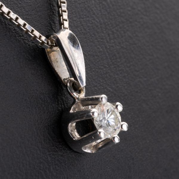 Vintage 14k gold pendant with a diamond