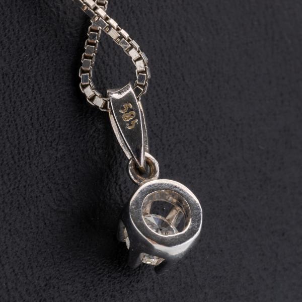 Vintage 14k gold pendant with a diamond