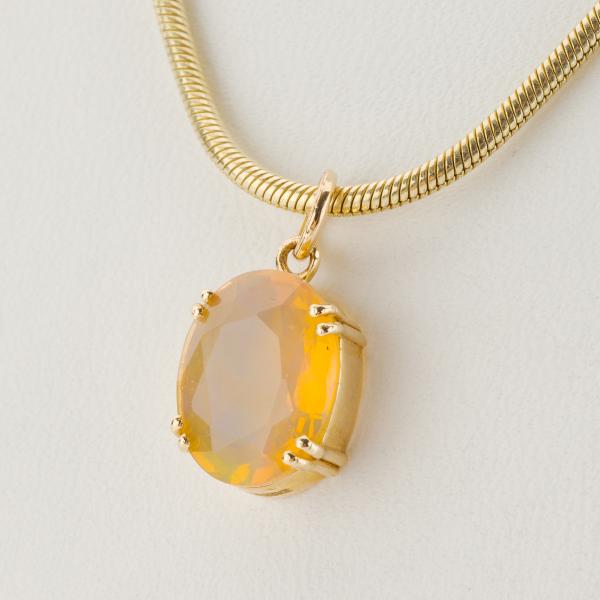 14k gold pendant with an opal