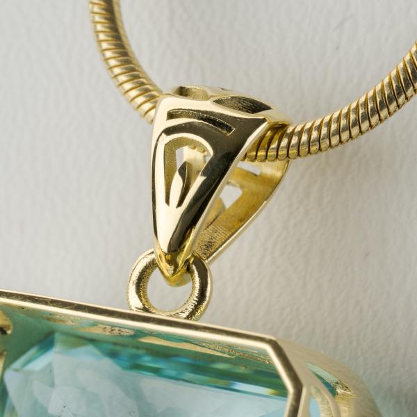 14k gold pendant with an 45.22ct aquamarine