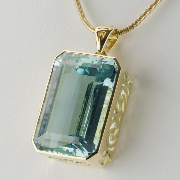 14k gold pendant with an 45.22ct aquamarine