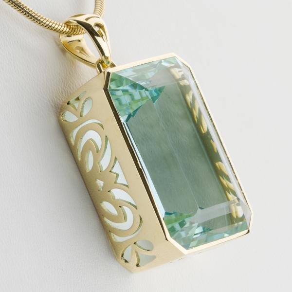 14k gold pendant with an 45.22ct aquamarine