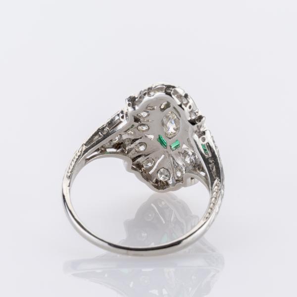0.80ct Diamond and 0.06ct Emerald Ring in Platinum