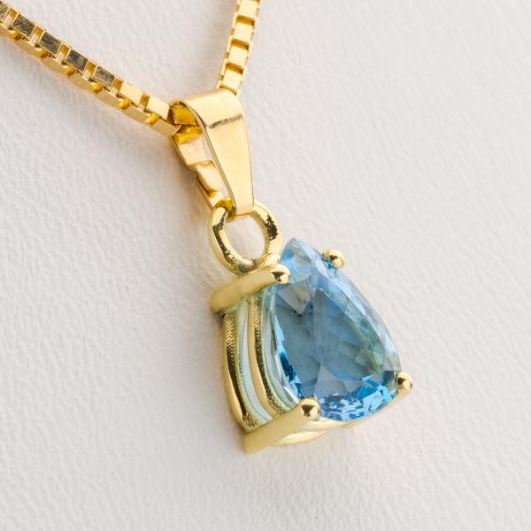 14k gold pendant with an aquamarine