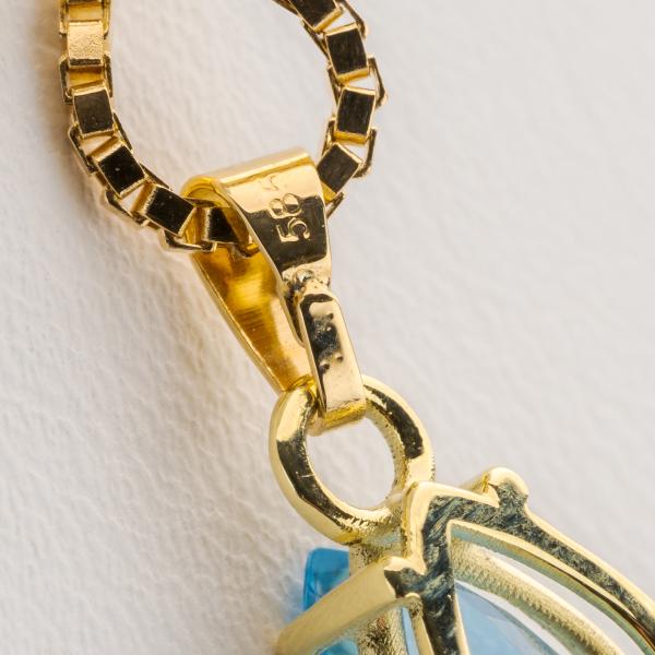 14k gold pendant with an aquamarine
