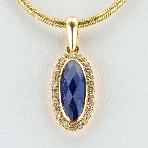 14k gold pendant with a 1.50ct sapphire and 0.30ct diamonds