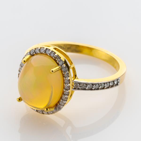 Opal Ring mit 0.40ct Brillanten aus 750er Gold